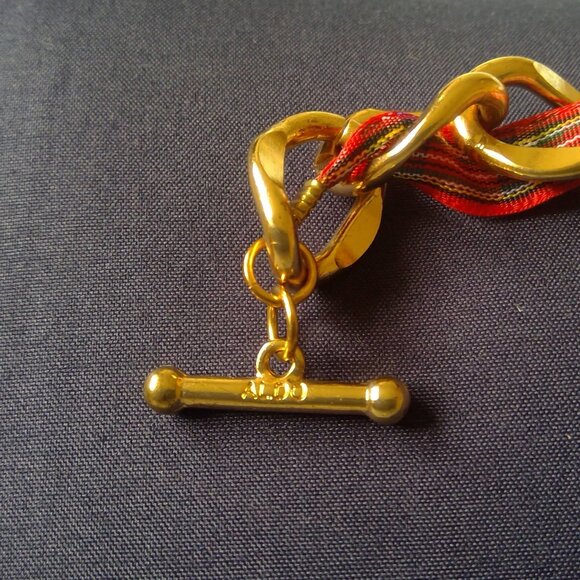 Gold tone chain bracelet with red tartan ribbon Aldo brand - Picture 5 of 6